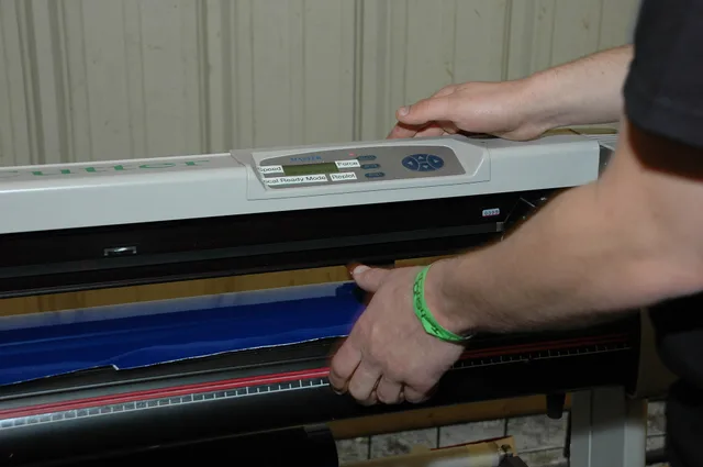 Maker Faire 2008, San Mateo - a vinyl cutter. Markets for sign shop as practitioners see it
