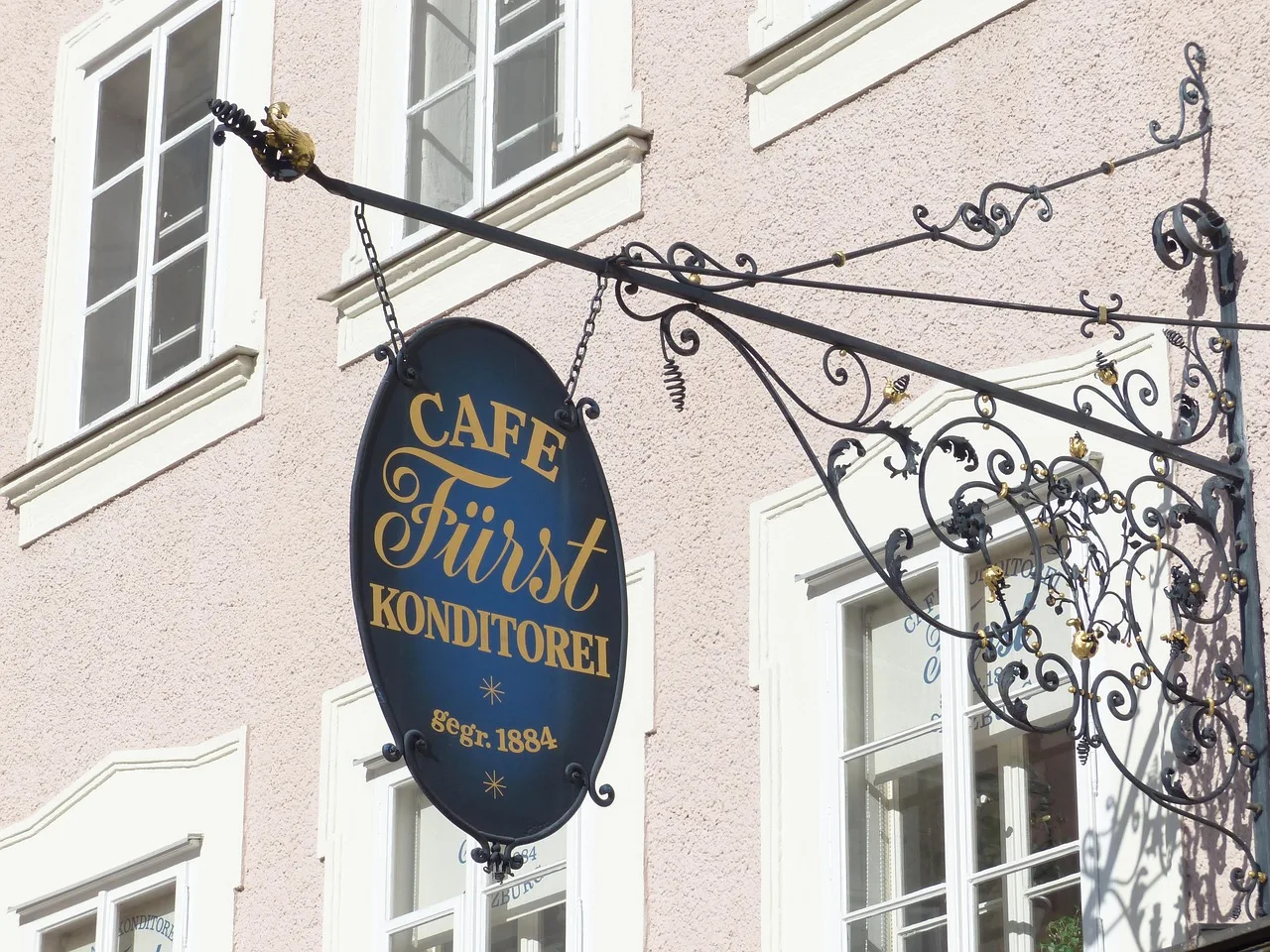cafe prince, pastry shop, salzburg, nasal shield, sign, advertising sign, blacksmithing, wrought iron, figurehead. Sign shop owners quality checks owners actually run